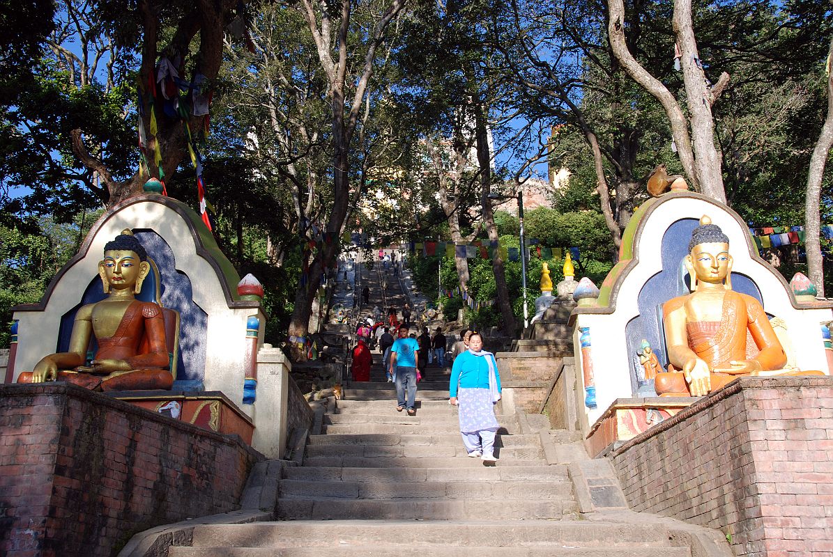 Kathmandu Swayambhunath 11 Buddha Statues Flank Steps Half Way To The Temple 